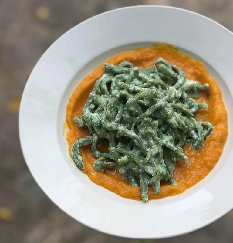 Green stringozzi noodles with creamy roasted squash and ricotta sauce